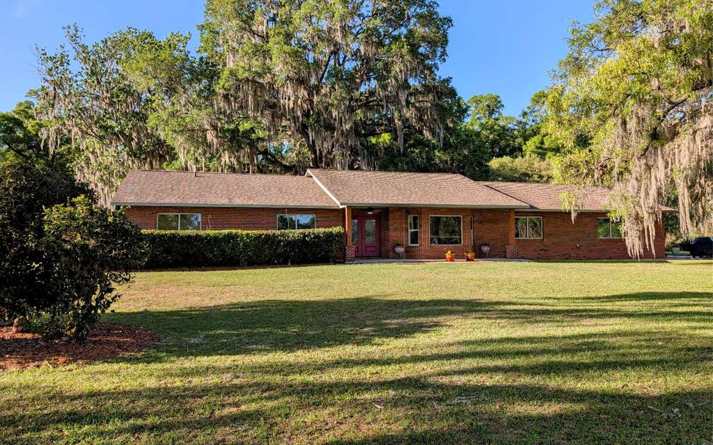 Photo of 21840 NW 218th Ter, High Springs, FL 32643 (MLS # 130959)