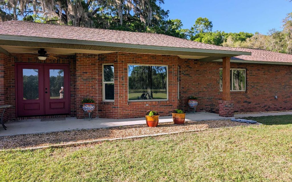 Photo of 21840 NW 218th Ter, High Springs, FL 32643 (MLS # 130959)