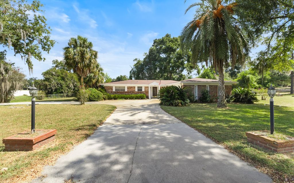 Photo of 451 NW Fairway Drive, Lake City, FL 32055 (MLS # 128580)