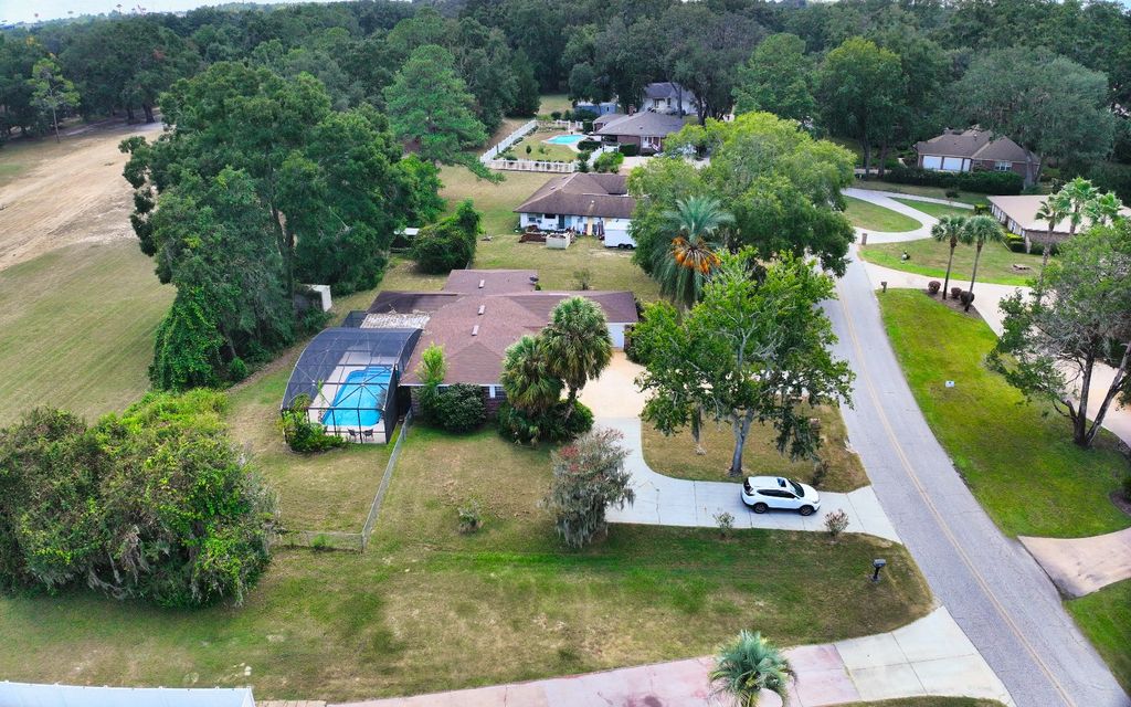 Photo of 451 NW Fairway Drive, Lake City, FL 32055 (MLS # 128580)