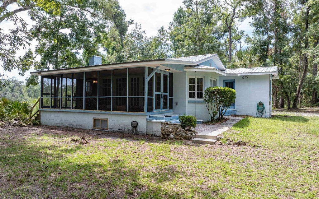 Photo of 1809 SE Boundary Bend Trail, Lee, FL 32059 (MLS # 132037)