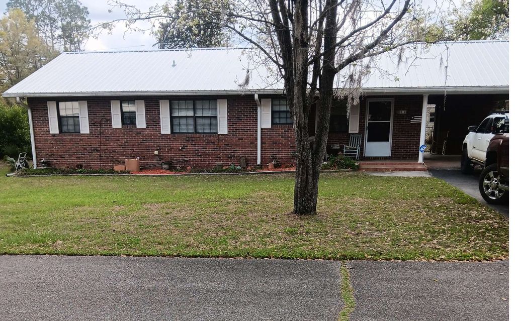 Photo of 514 SE Marymac St, Live Oak, FL 32064 (MLS # 130673)