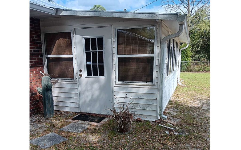 Photo of 514 SE Marymac St, Live Oak, FL 32064 (MLS # 130673)