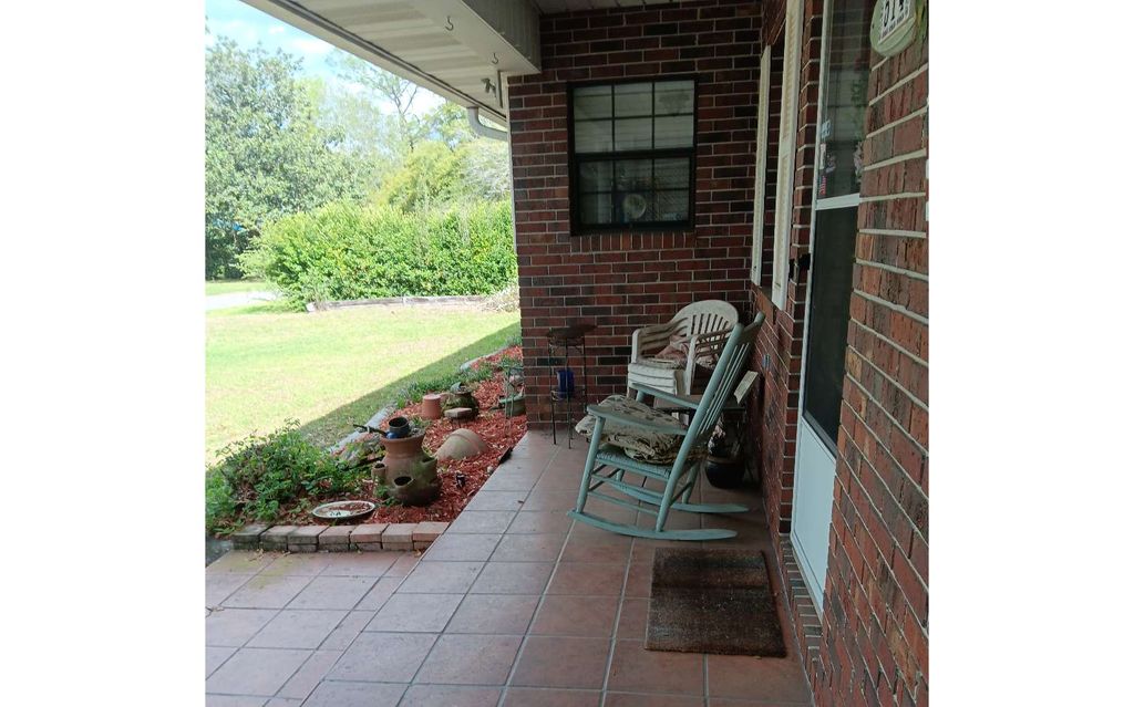 Photo of 514 SE Marymac St, Live Oak, FL 32064 (MLS # 130673)