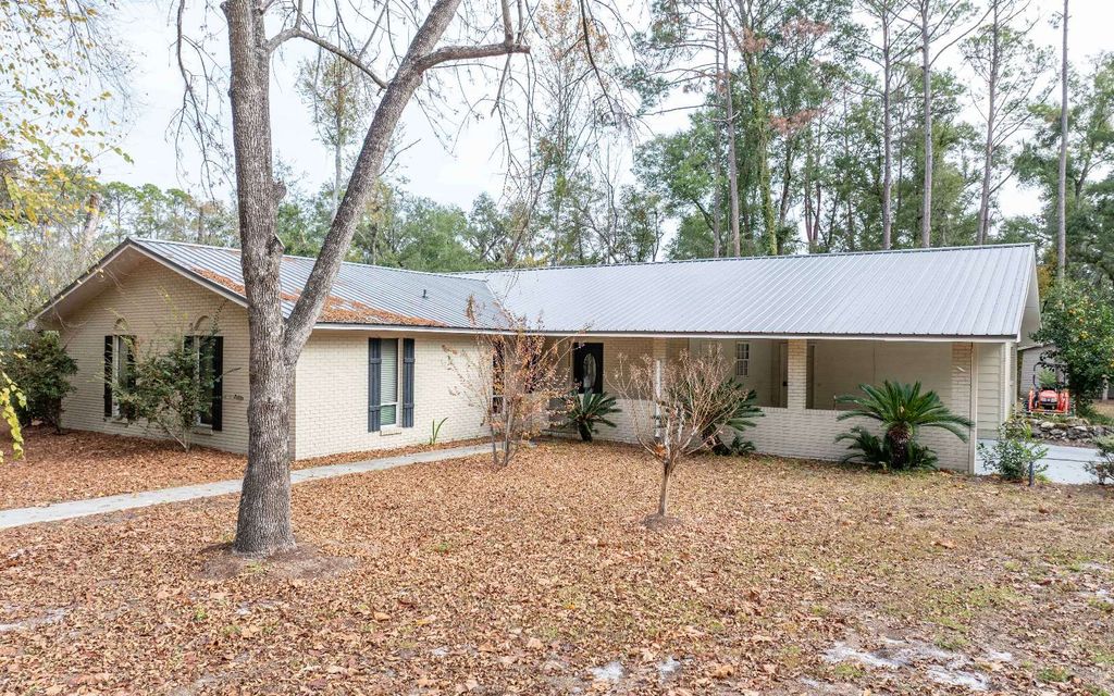 Photo of 8820 135th Road, Live Oak, FL 32060 (MLS # 129473)