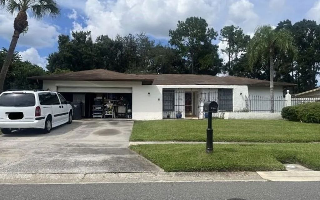 Photo of 14037 Wolcott Dr, Other, FL 33624 (MLS # 129634)