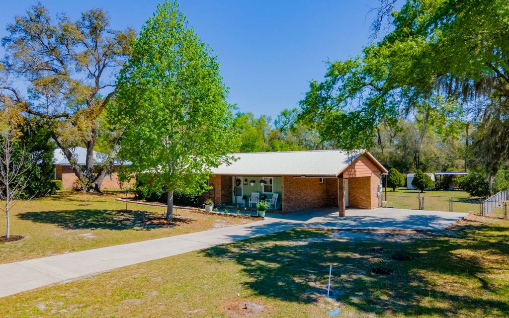 Photo of 1805 SW Cottage Ave, Live Oak, FL 32064 (MLS # 130761)