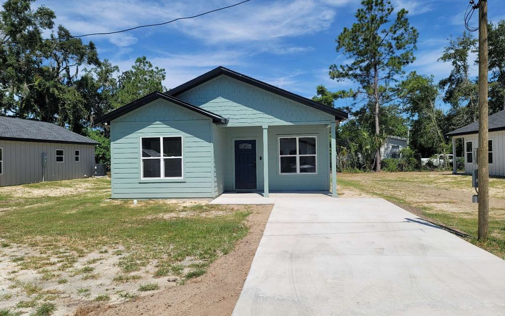 Photo of 835 NE Elsey Place, Lake City, FL 32055 (MLS # 128470)