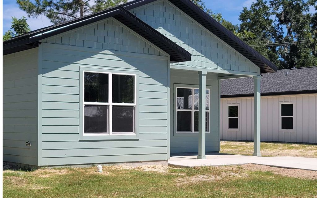 Photo of 835 NE Elsey Place, Lake City, FL 32055 (MLS # 128470)
