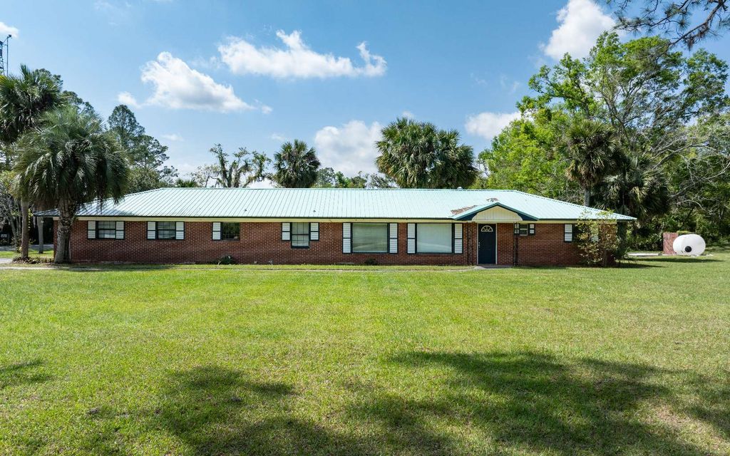 Photo of 7601 133rd Road, Live Oak, FL 32060 (MLS # 128786)