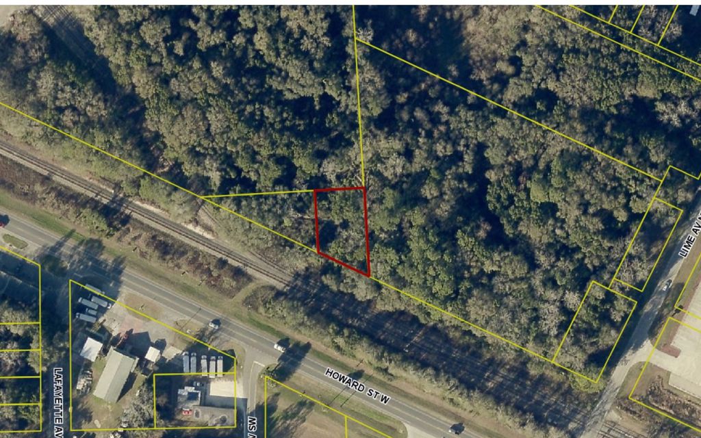 Photo of TBD Howard St, Live Oak, FL 32064 (MLS # 128588)