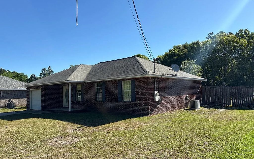 Photo of 5386 Traci Dr, Other, FL 32583 (MLS # 131199)