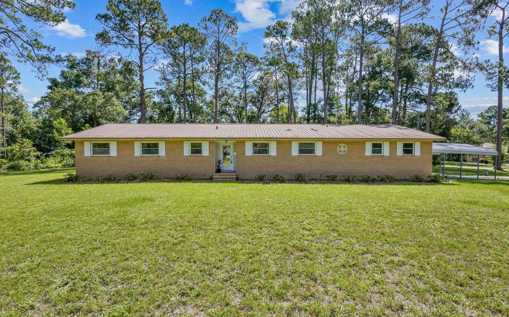 Photo of 205 SW Dalmation Lane, Lake City, FL 32024 (MLS # 128116)