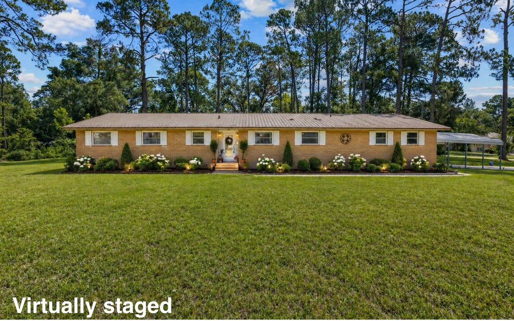 Photo of 205 SW Dalmation Lane, Lake City, FL 32024 (MLS # 128116)