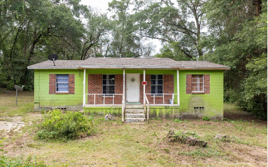 Photo of 14105 NW 167th Pl, Alachua, FL 32615 (MLS # 132304)