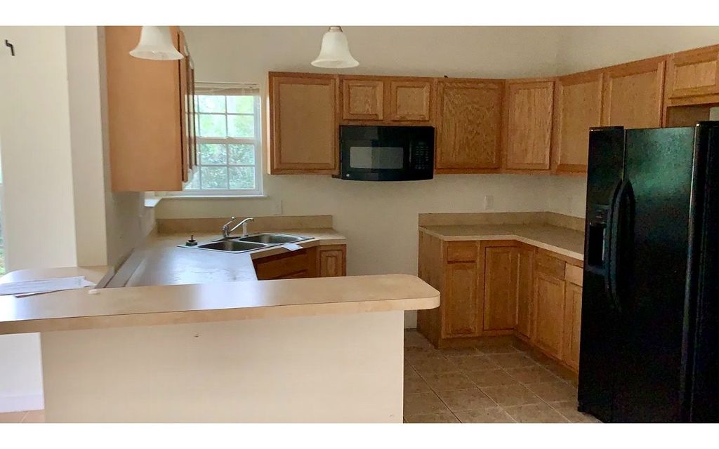 Photo of 627 NE Washington Street, Lake City, FL 32055 (MLS # 128301)