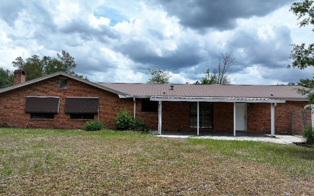Photo of 886 SW Dekle Rd, Lake City, FL 32024 (MLS # 126932)