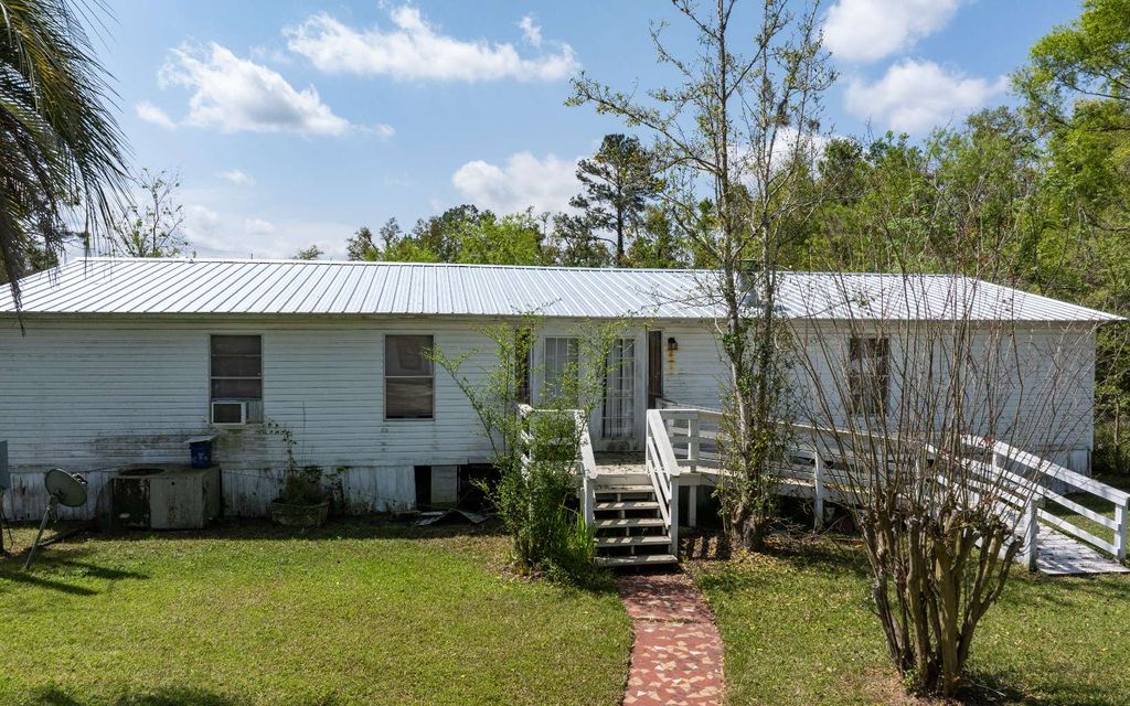 Photo of 7601 133rd Road, Live Oak, FL 32060 (MLS # 129931)