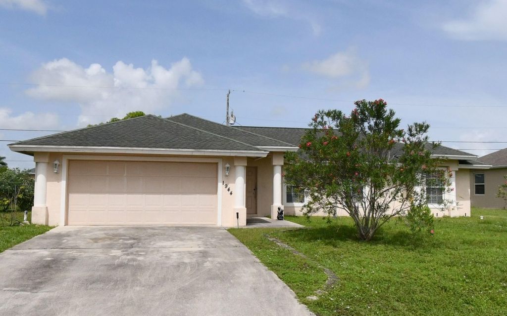 Photo of 1944 SW Breezeway St, Other, FL 34987 (MLS # 128852)