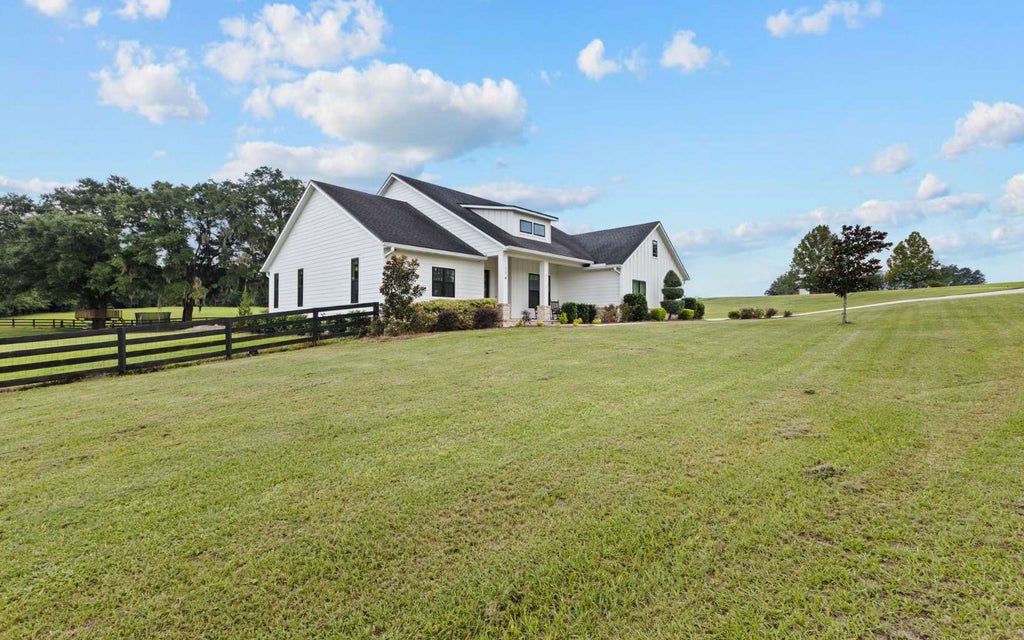 Photo of 174 NW High Point Dr, Lake City, FL 32055 (MLS # 132974)
