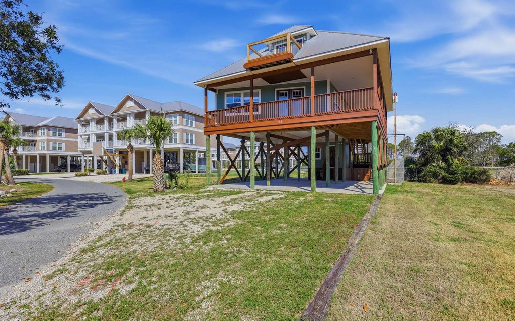 Photo of 181 E 3rd Ave, Horseshoe Beach, FL 32648 (MLS # 130903)