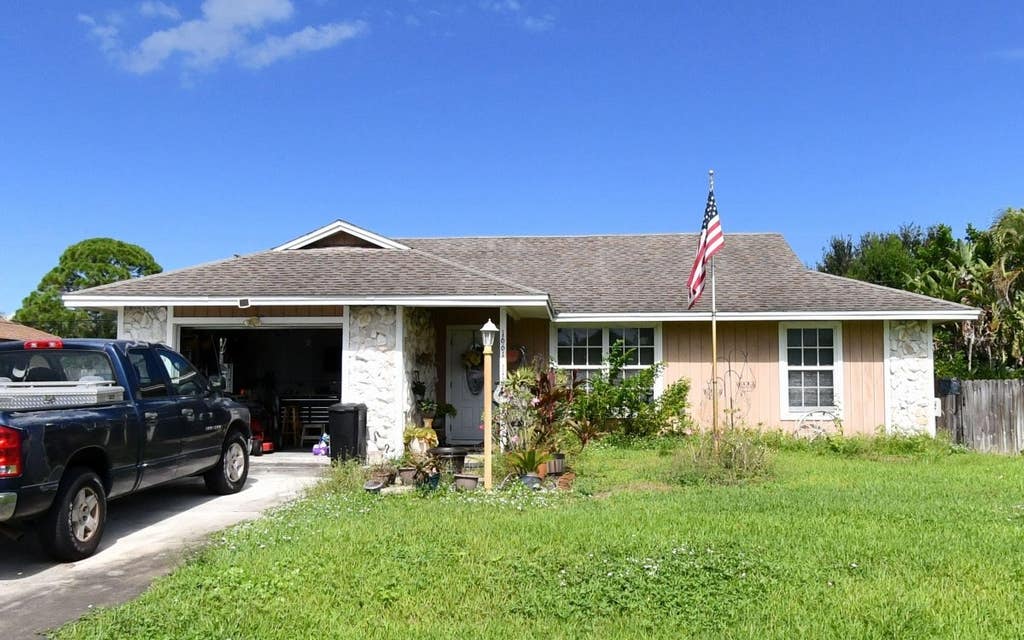 Photo of 1661 SE Trumpet Ln, Other, FL 34983 (MLS # 132705)