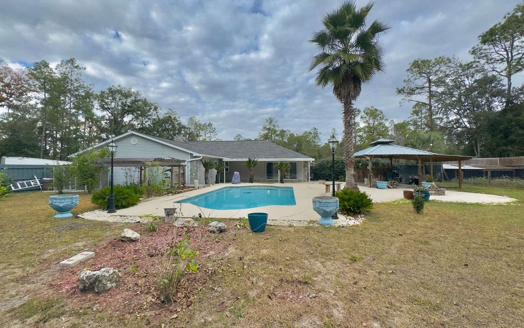 Photo of 12860 County Road 137, Wellborn, FL 32094 (MLS # 129461)