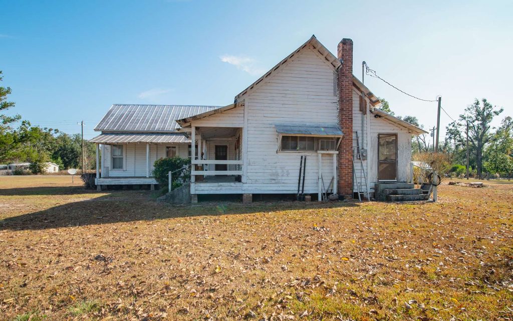 Photo of 7091 River Road, Live Oak, FL 32060 (MLS # 129391)