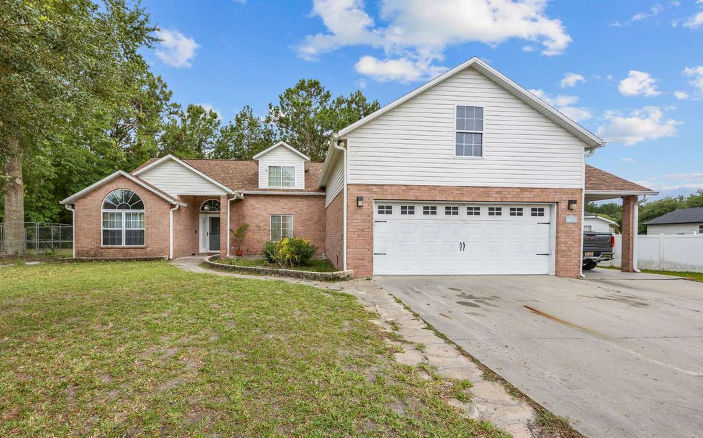 Photo of 928 SW Gator Ct, Lake City, FL 32025 (MLS # 128579)