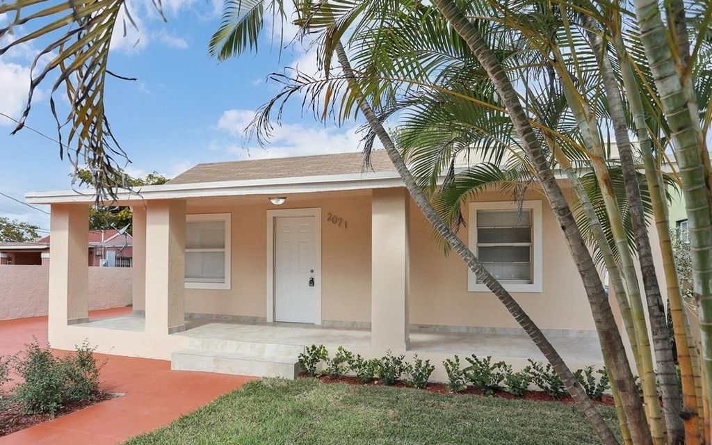 Photo of 2071 NW 86th St, Other, FL 33147 (MLS # 129956)