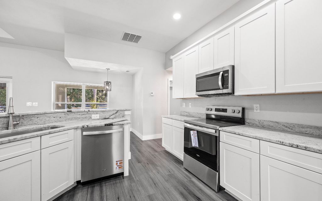 Photo of 2887 NW 143rd Terrace, Newberry, FL 32669 (MLS # 129244)