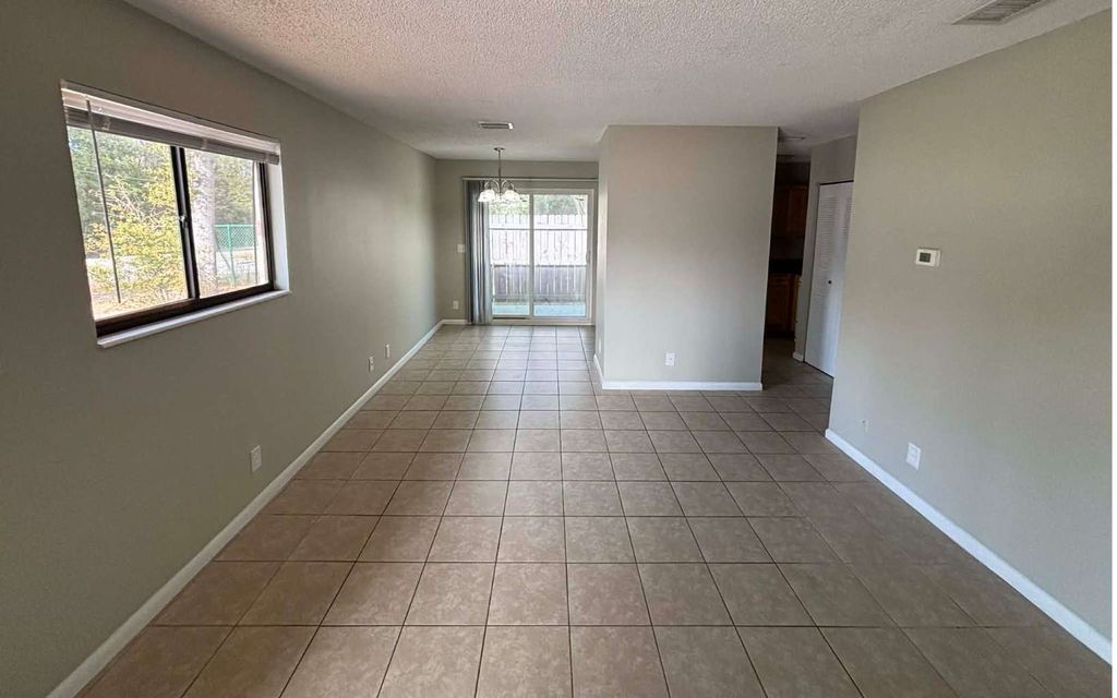 Photo of 519 NW Lake City Ave #103 Ave, Lake City, FL 32055 (MLS # 117355)