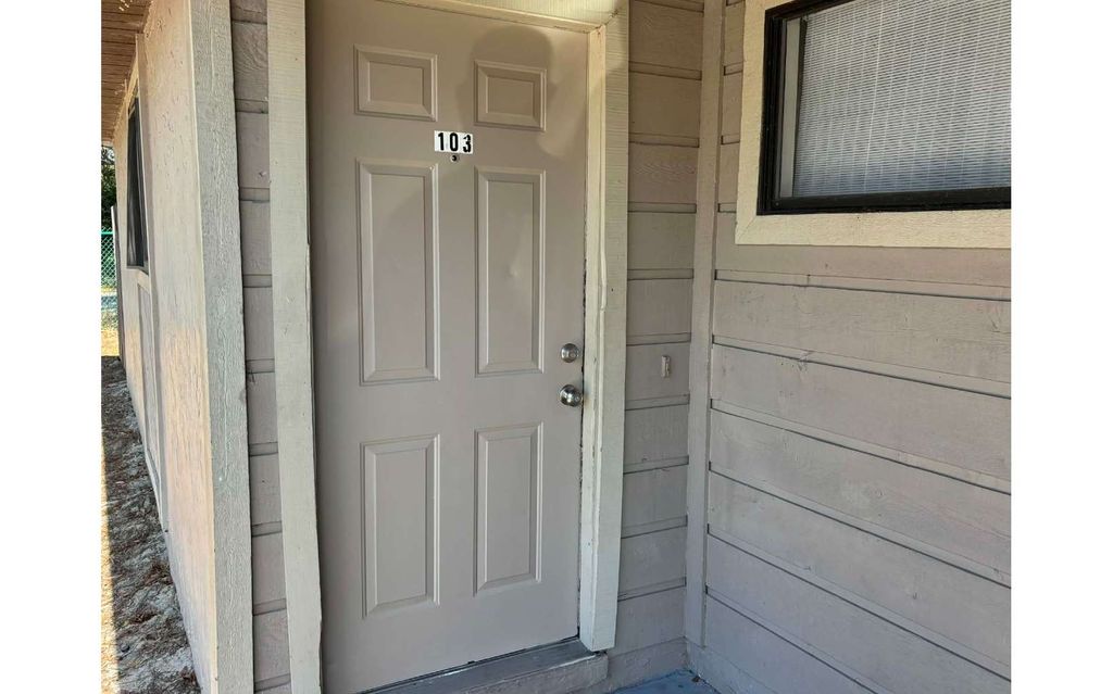 Photo of 519 NW Lake City Ave #103 Ave, Lake City, FL 32055 (MLS # 117355)