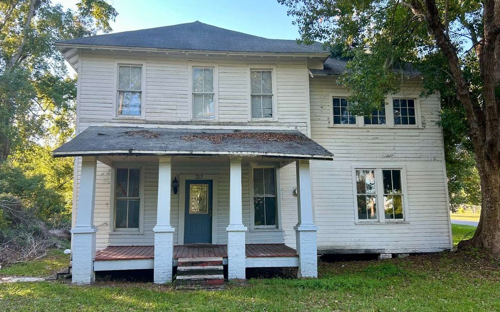 Photo of 313 NW Scriven Ave, Live Oak, FL 32064 (MLS # 128908)