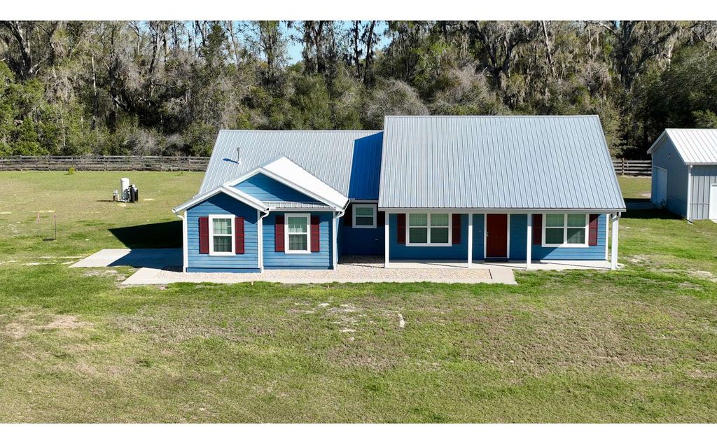 Photo of 249 SW Pleasant Hill Glen, Fort White, FL 32038 (MLS # 125482)