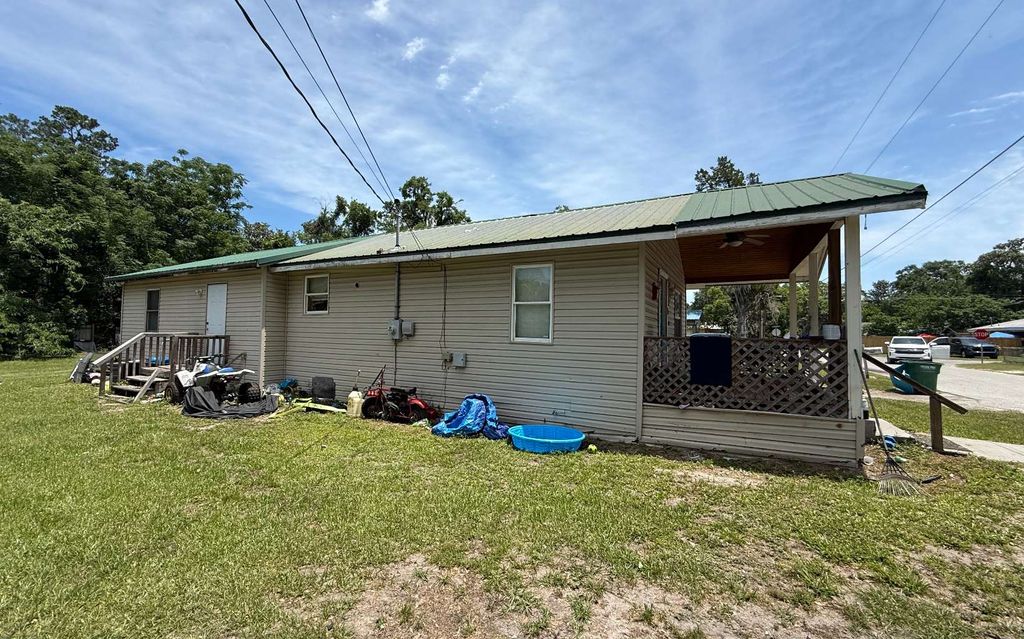 Photo of 849 NE Maple Ln, Lake City, FL 32055 (MLS # 128890)