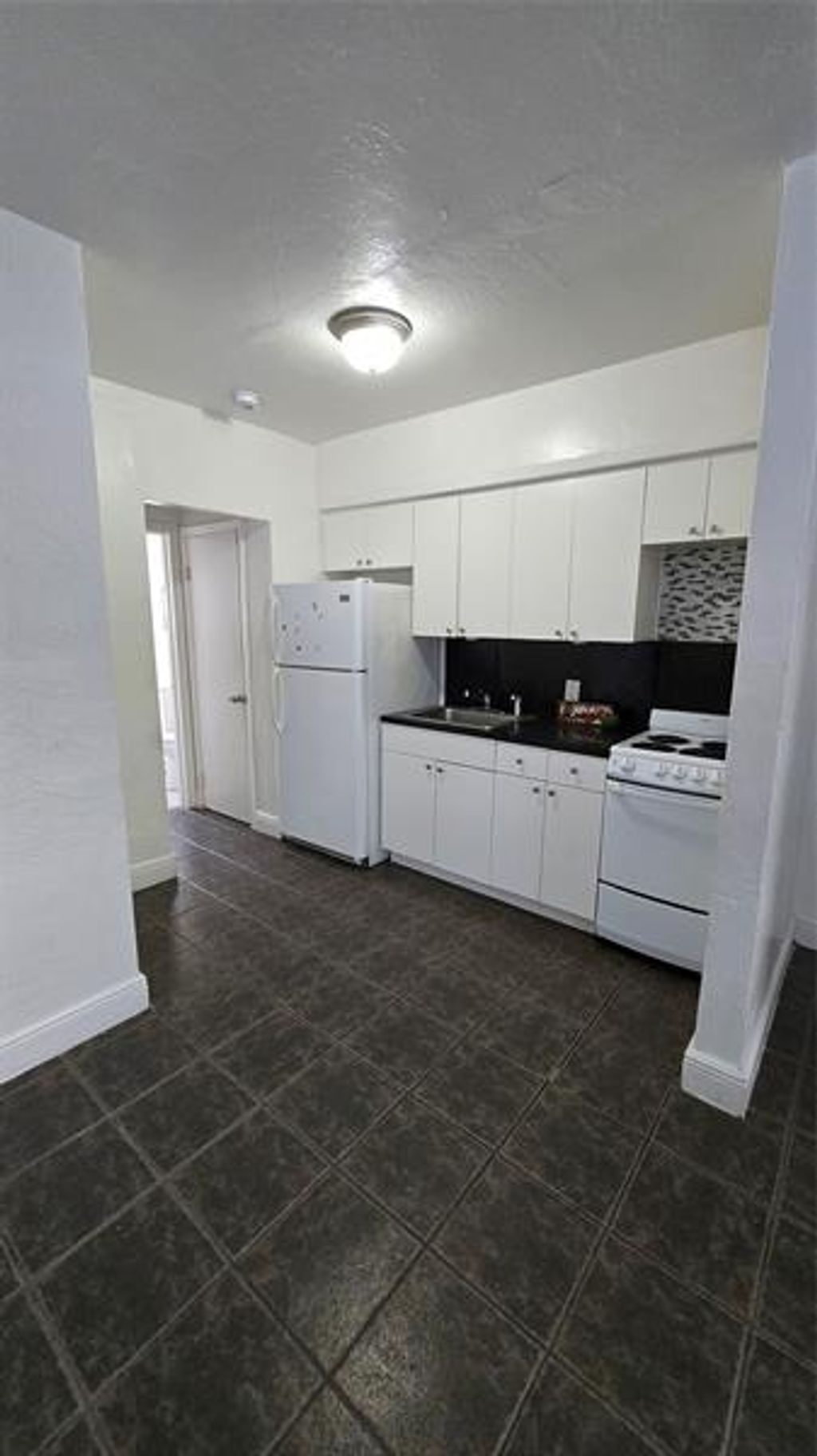 Photo of 1012 NW 2nd Ave #2, Hallandale Beach, FL 33009 (MLS # F10534039)