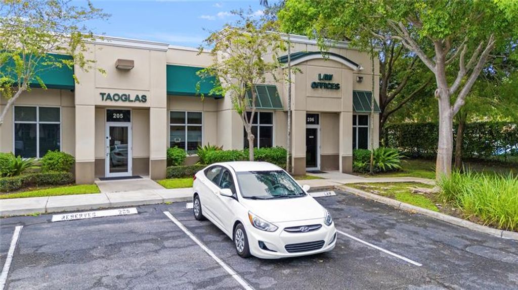 Photo of 5497 Wiles Rd #205, Coconut Creek, FL 33073 (MLS # F10531313)