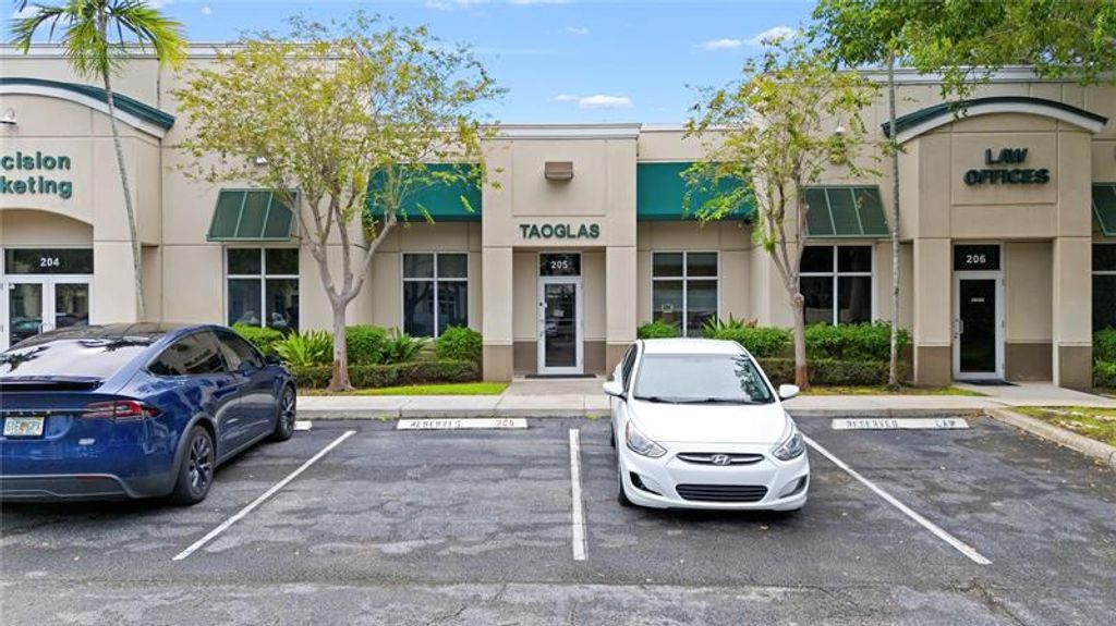 Photo of 5497 Wiles Rd #205, Coconut Creek, FL 33073 (MLS # F10531313)