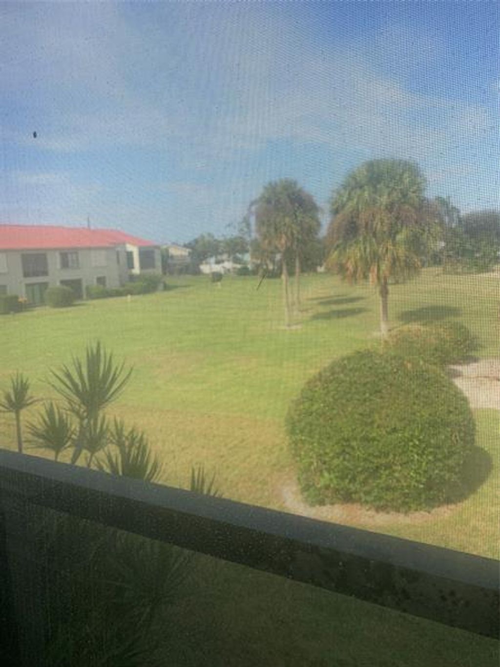 Photo of 5463 SE Miles Grant Rd #B 205, Stuart, FL 34997 (MLS # F10515748)