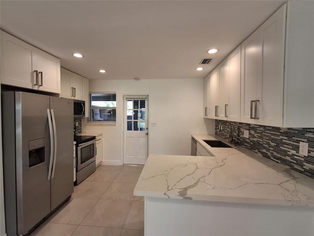 Photo of 2300 NW 3rd Ave #S, Wilton Manors, FL 33311 (MLS # F10533270)