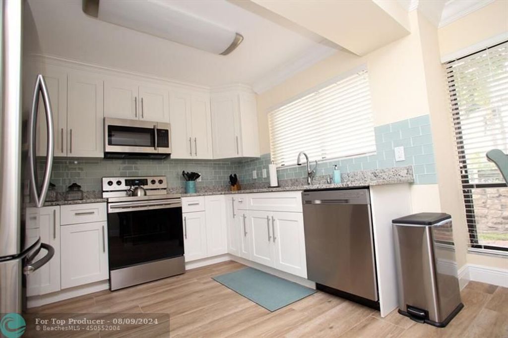 Photo of 67 Balfour Rd, Palm Beach Gardens, FL 33418 (MLS # F10455432)