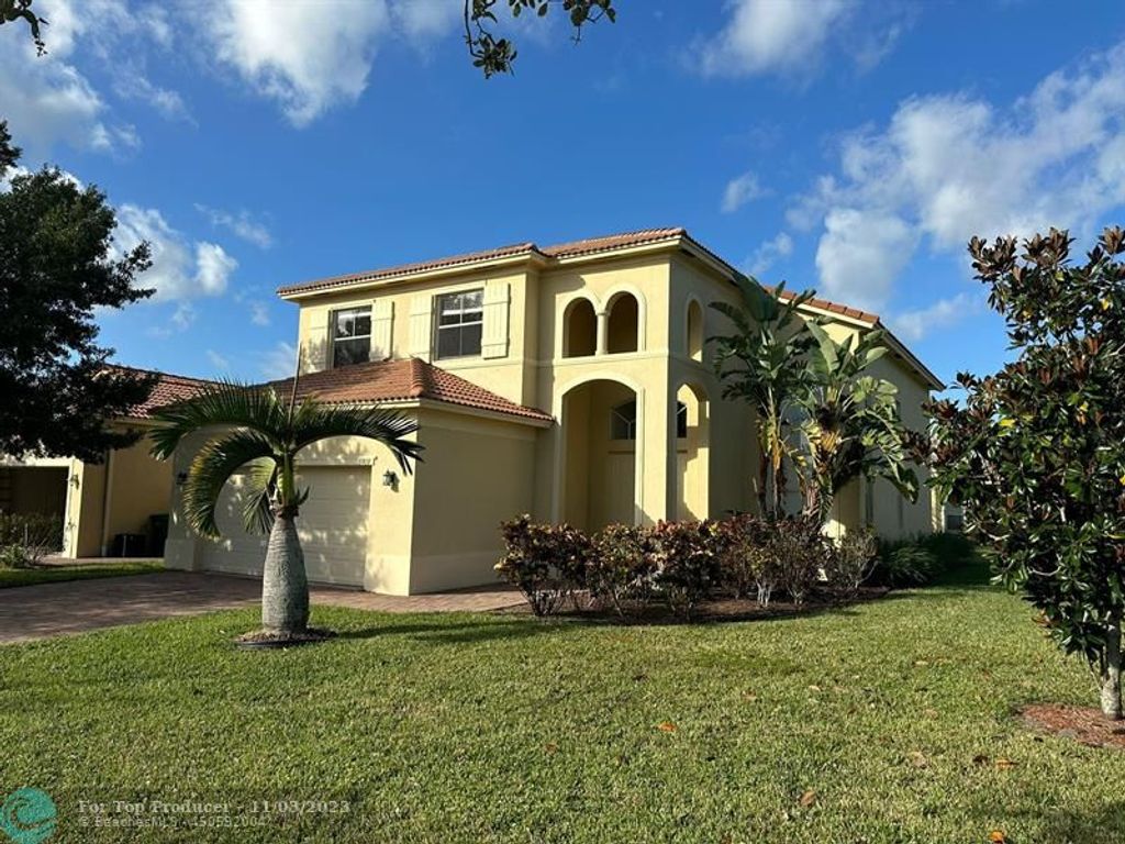 Photo of 5919 Walnut Park Ln, Fort Pierce, FL 34951 (MLS # F10407852)