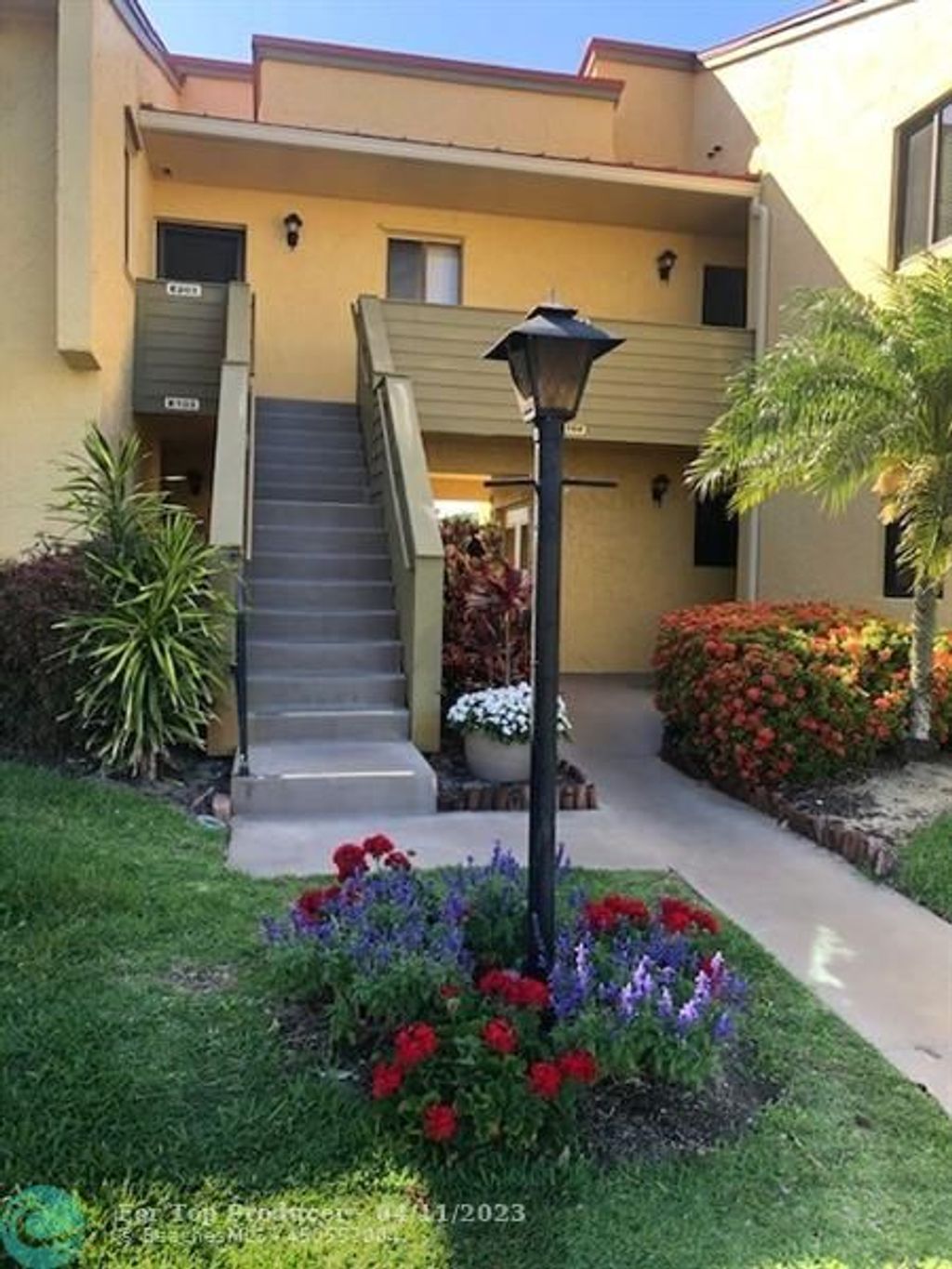 Photo of 5355 SE Miles Grant Rd #E203, Stuart, FL 34997 (MLS # F10375640)