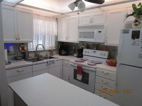 Photo of 8841 Sunrise Lakes Blvd #112, Sunrise, FL 33322 (MLS # F10530883)
