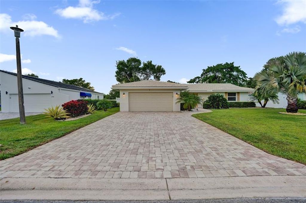 Photo of 1748 NW 85th Dr, Coral Springs, FL 33071 (MLS # F10534032)