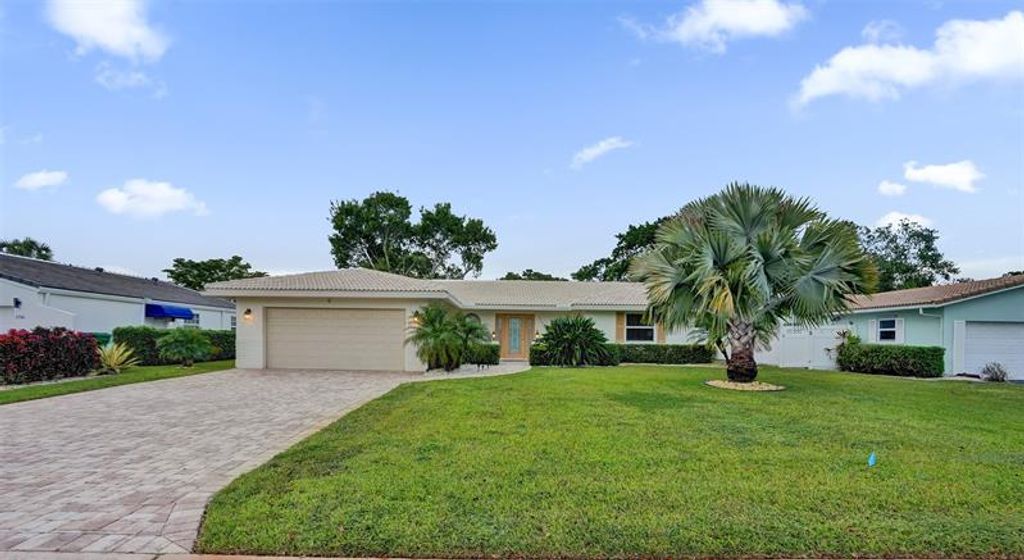 Photo of 1748 NW 85th Dr, Coral Springs, FL 33071 (MLS # F10534032)