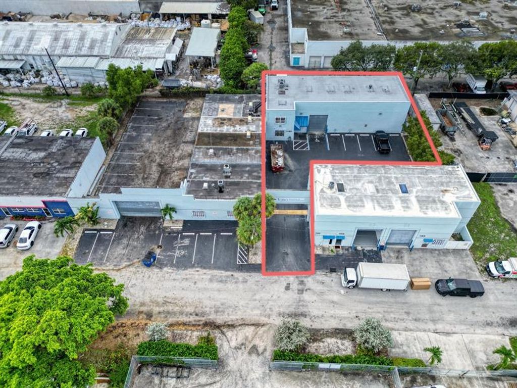 Photo of 1120 NW 54th St, Fort Lauderdale, FL 33309 (MLS # F10528319)