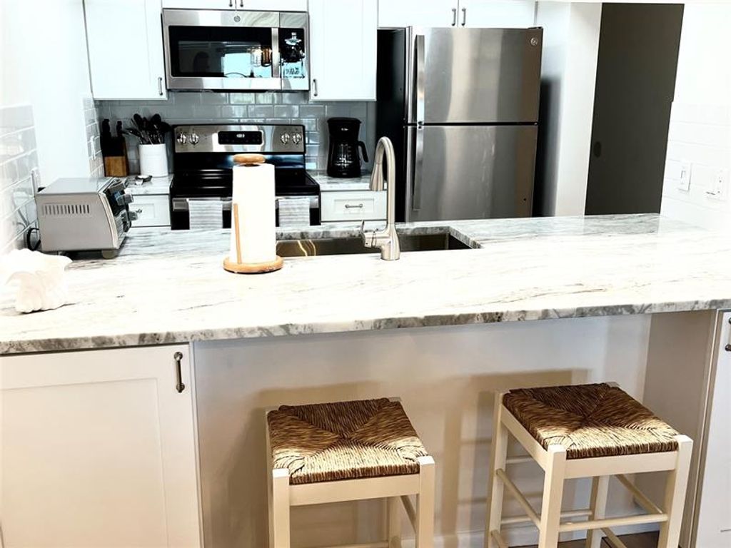 Photo of 40 NE Plantation Rd #410, Stuart, FL 34996 (MLS # F10512758)