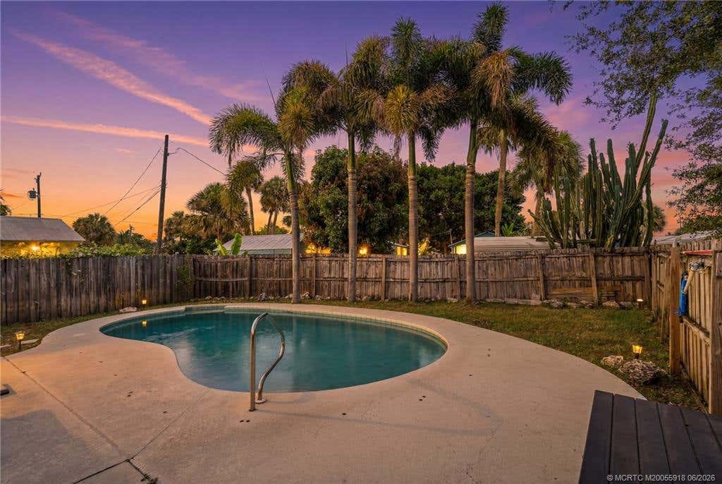 Photo of 2495 NE Hickory Avenue, Jensen Beach, FL 34957 (MLS # M20055918)